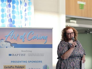 Angela Hamblen Kelly, administrator of bereavement services, speaks at Baptist Art of Caring.